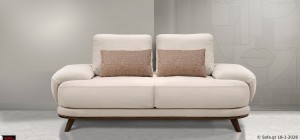 Διθέσιος καναπές Symmetry σε μπουκλέ ύφασμα με απαλές καμπύλες και μαλακή αίσθηση καθίσματος.