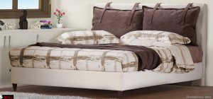 κρεβάτι υφασμάτινο με μαξιλάρες στο κεφαλάρι και ψηλό ποδαράκαι